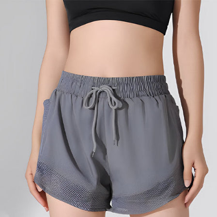 Short de sport femme gris avec doulure integrer
