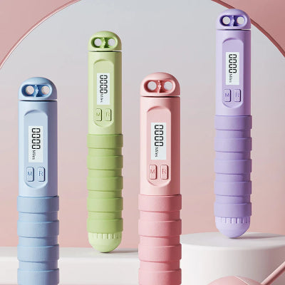 Corde a sauter image montrant les couleus rose bleu vert violet disponible