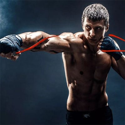 Élastique musculation rouge homme extension bras