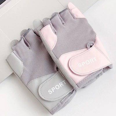 Gant musculation photo montrant les gants en couleur rose sur fond blanc