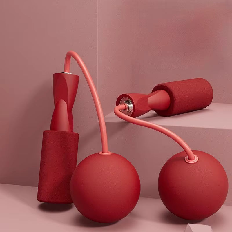 Corde à sauter sans fil rouge avec boules de rotation