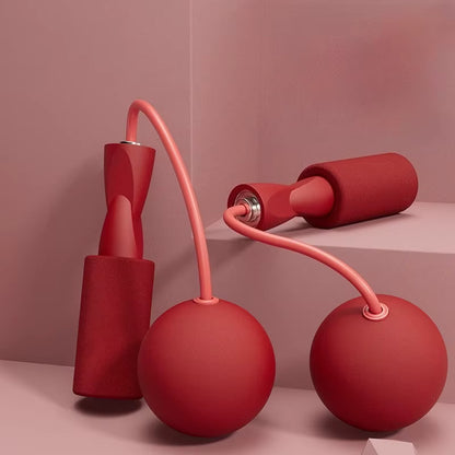 Corde à sauter sans fil rouge avec boules de rotation