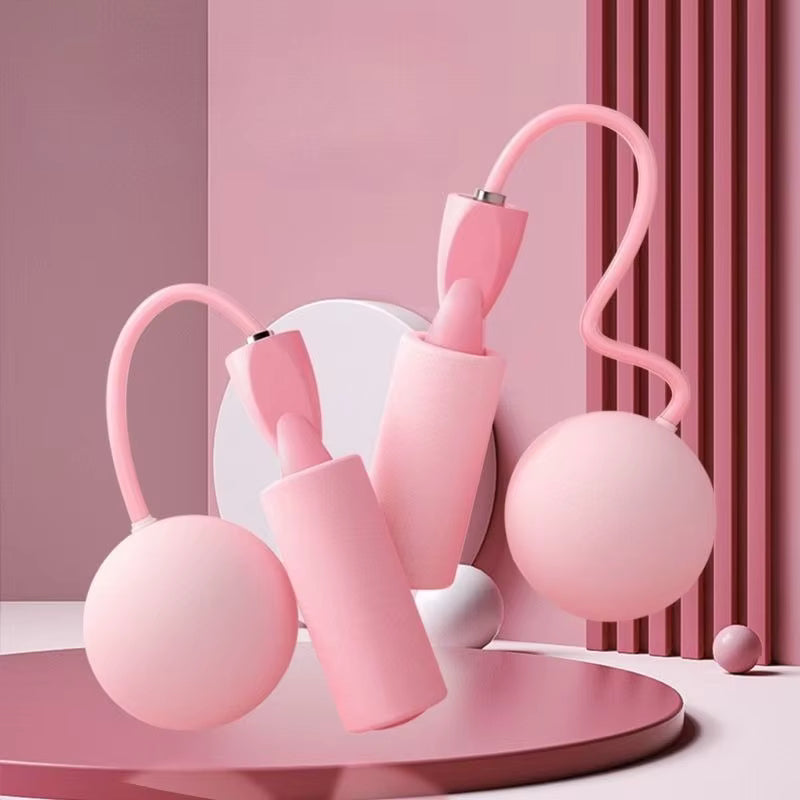 Corde à sauter sans fil rose avec boules de rotation