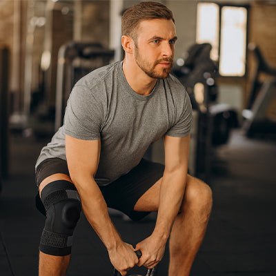 Genouillere sport homme entrainement kettlebell