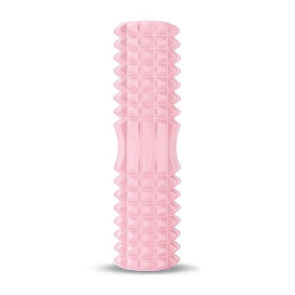 Rouleau de massage rose en position verticale