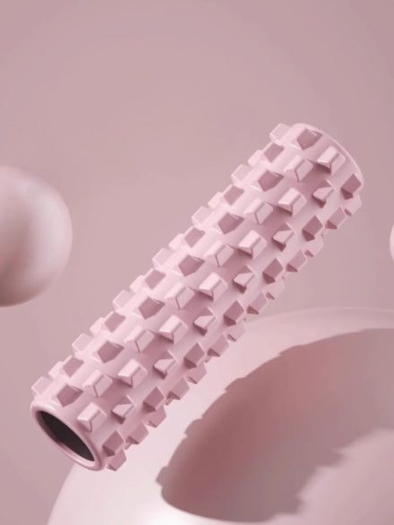 rouleau de massage rose flotte dans les air