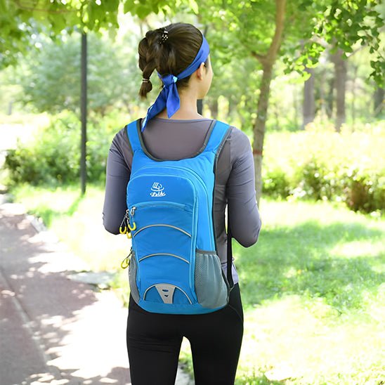 Sac a dos sport bleu femme marche foret