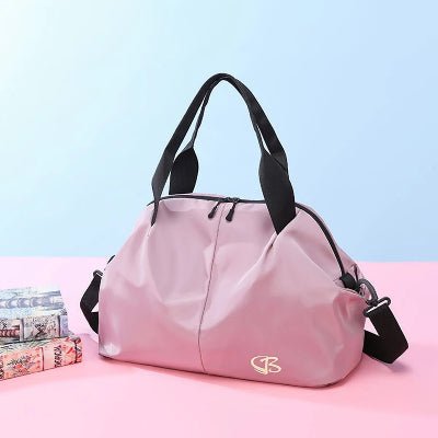 Sac de sport rose sept compartiments