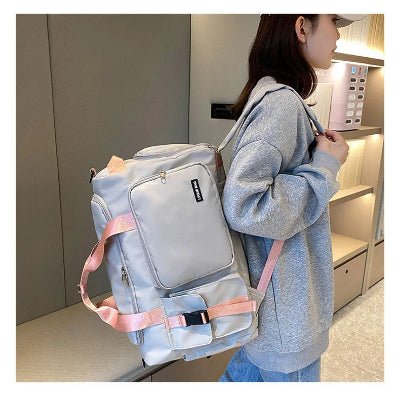 Sac de sport gris poignee rose