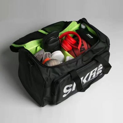 Sac de sport noir interieur vert