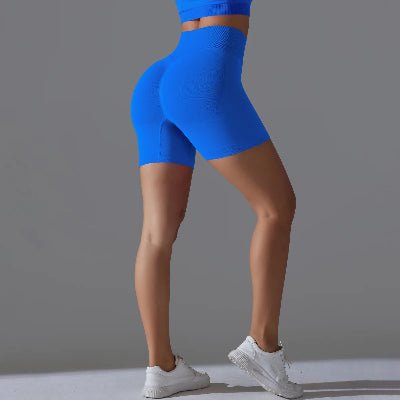 Short de sport femme debout bleu