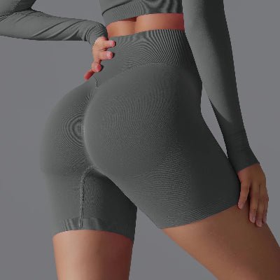 Short de sport femme position cote gris