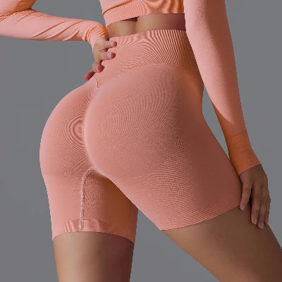 Short de sport femme couleur orange-pale