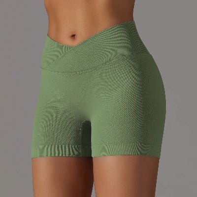 Vert short de sport femme de cote