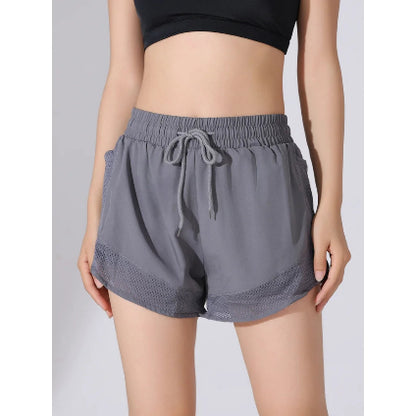 Short de sport femme de couleur gris avec doublure integrer